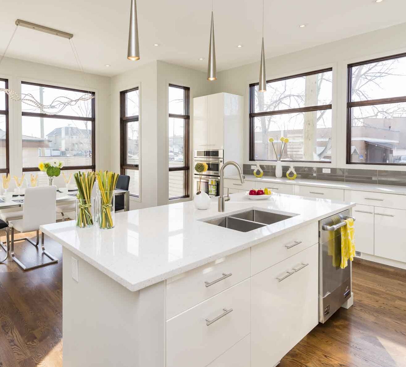 Interior shot of a modern house kitchen with large windows